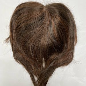 Jon R Essentially You topper that clips into existing hair, blending seamlessly.